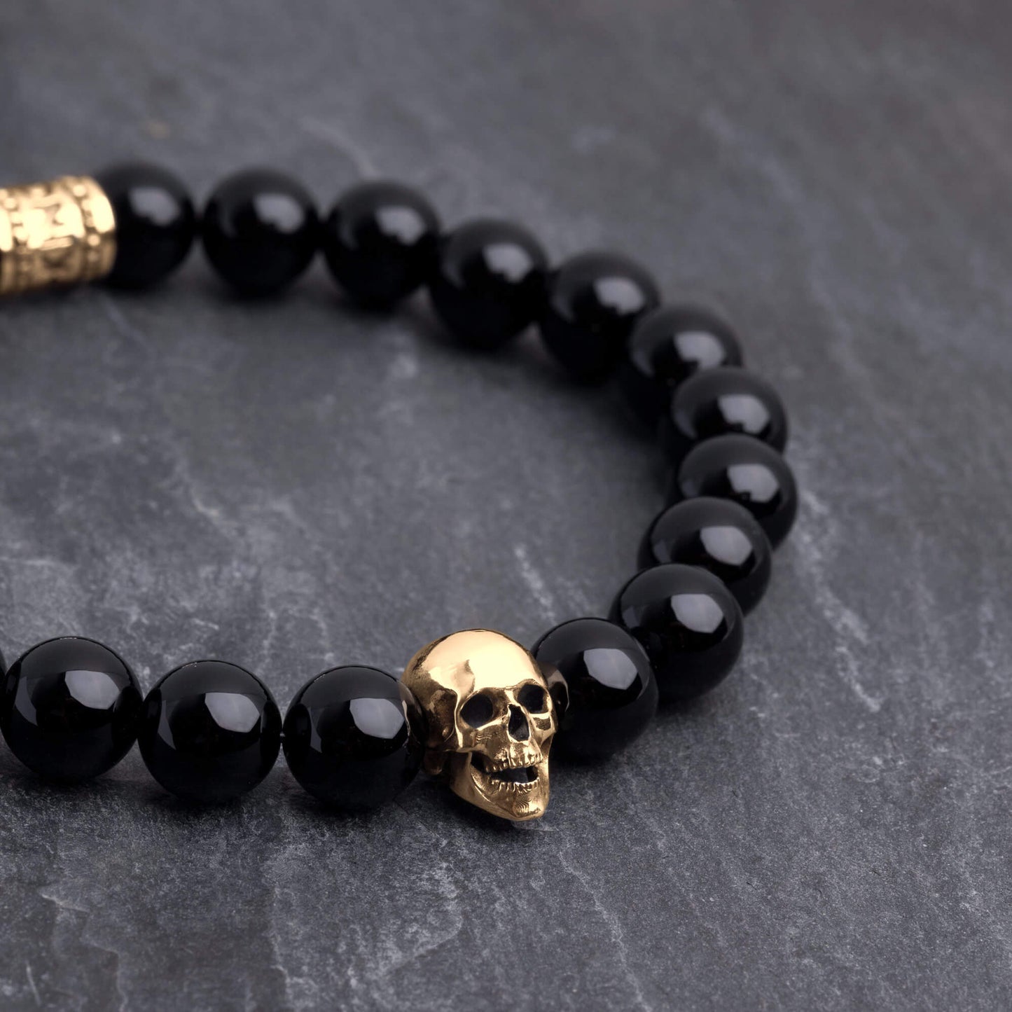 Bransoletka z korali "Skull" (Onyks, 8mm)