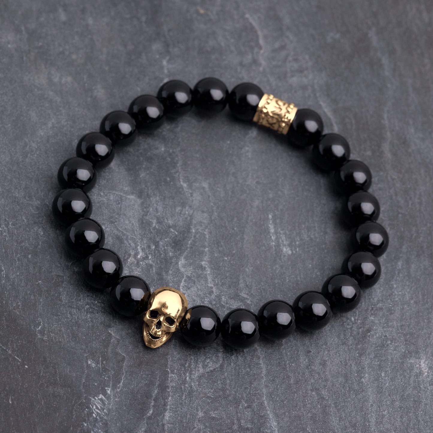 Bransoletka z korali "Skull" (Onyks, 8mm)